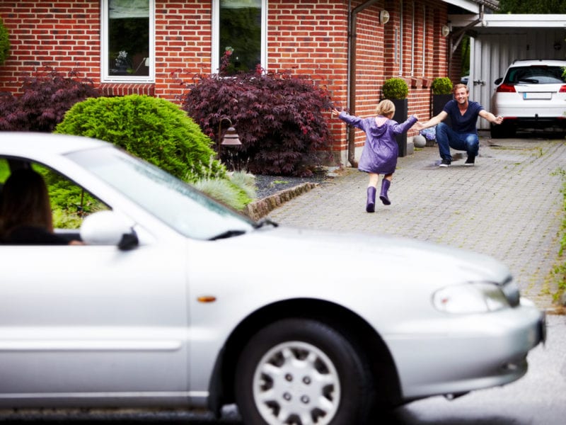 Cute little girl running towards her dad