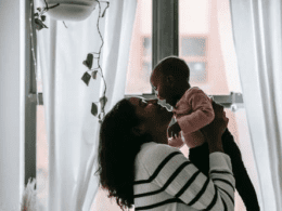 a mother holding her child