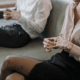 A couple removing their wedding bands after separation