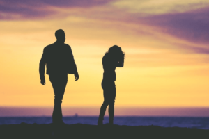 Divorce Proceedings -silhouettes of a man and woman