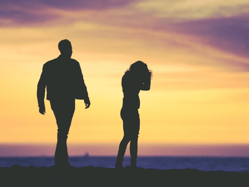 Divorce Proceedings -silhouettes of a man and woman