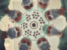 divorce - Surgeons smiling at a patient