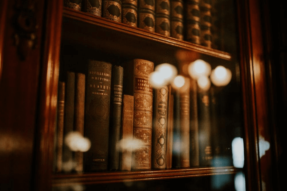 law books showcased in a glass bookcase